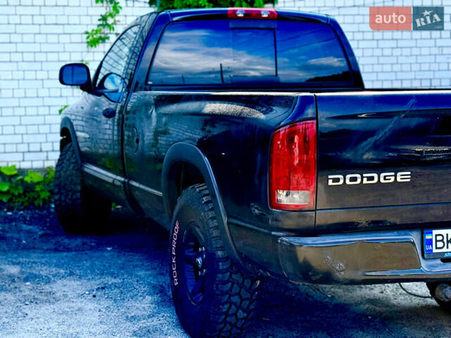 Черный Додж RAM 1500, объемом двигателя 4.7 л и пробегом 82 тыс. км за 8700 $, фото 9 на Automoto.ua