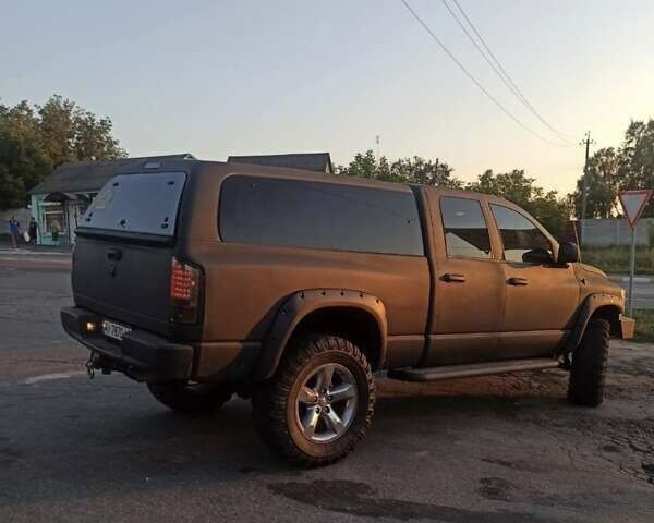 Черный Додж RAM 1500, объемом двигателя 4.7 л и пробегом 160 тыс. км за 10000 $, фото 1 на Automoto.ua