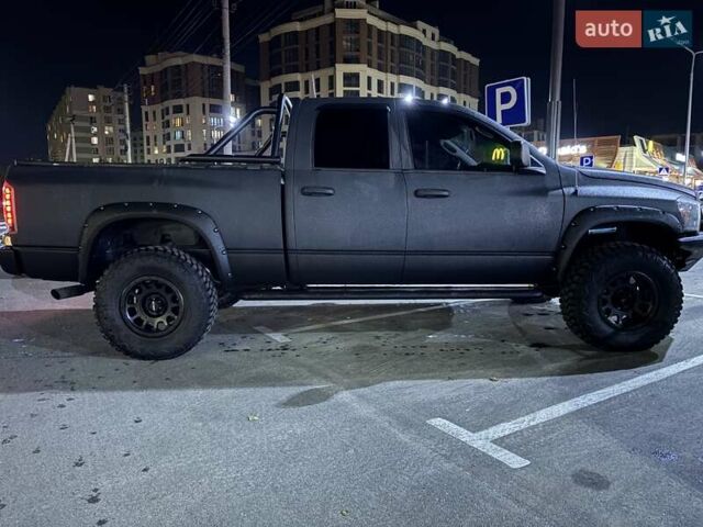 Черный Додж RAM 1500, объемом двигателя 5.65 л и пробегом 170 тыс. км за 27000 $, фото 6 на Automoto.ua