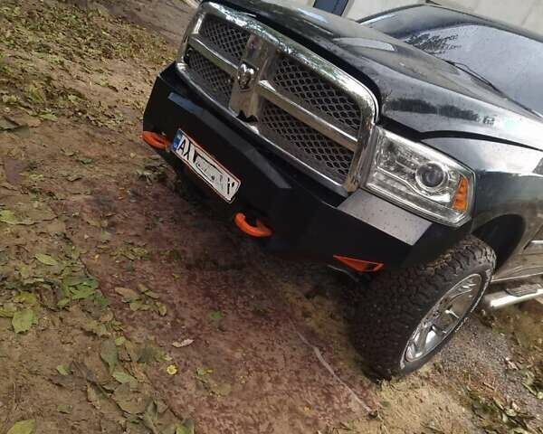 Черный Додж RAM 1500, объемом двигателя 5.65 л и пробегом 110 тыс. км за 18000 $, фото 1 на Automoto.ua