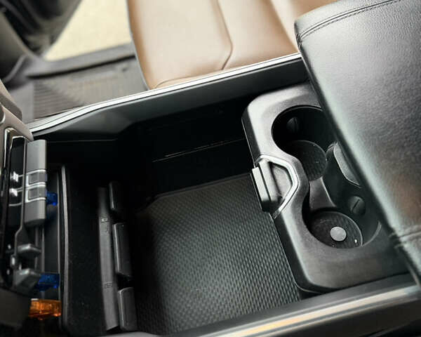 Черный Додж RAM 1500, объемом двигателя 5.7 л и пробегом 102 тыс. км за 49800 $, фото 19 на Automoto.ua