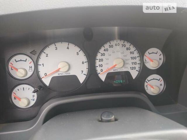 Красный Додж RAM 1500, объемом двигателя 5.7 л и пробегом 65 тыс. км за 9500 $, фото 6 на Automoto.ua