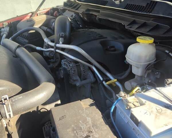 Красный Додж RAM 1500, объемом двигателя 5.65 л и пробегом 117 тыс. км за 25000 $, фото 33 на Automoto.ua