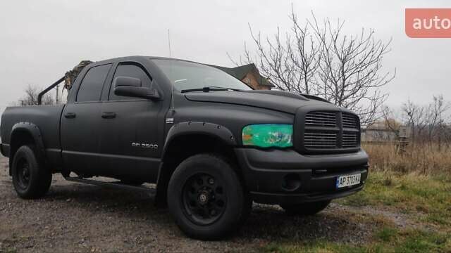 Черный Додж RAM 2500, объемом двигателя 5.65 л и пробегом 300 тыс. км за 15000 $, фото 1 на Automoto.ua