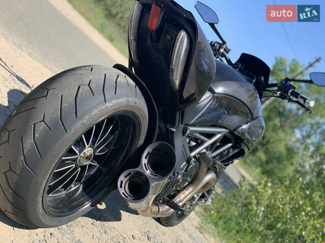 Дукати Diavel 1200 Carbon 2013 в Киеве на Automoto.ua Дукати Diavel 1200 Carbon, объемом двигателя 0 л и пробегом 13 тыс. км за 14500 $, фото 1 на Automoto.ua