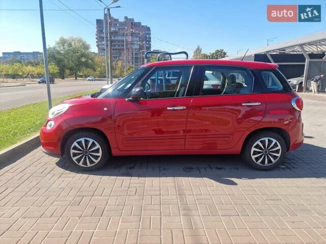 Красный Фиат 500L, объемом двигателя 1.4 л и пробегом 305 тыс. км за 7200 $, фото 1 на Automoto.ua
