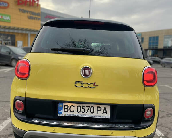 Желтый Фиат 500L, объемом двигателя 1.25 л и пробегом 156 тыс. км за 9850 $, фото 4 на Automoto.ua