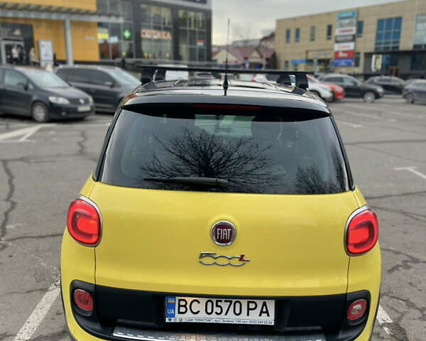 Желтый Фиат 500L, объемом двигателя 1.25 л и пробегом 156 тыс. км за 9850 $, фото 7 на Automoto.ua