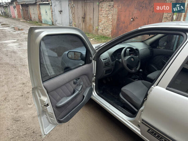 Серый Фиат Альбеа, объемом двигателя 1.4 л и пробегом 160 тыс. км за 2850 $, фото 1 на Automoto.ua