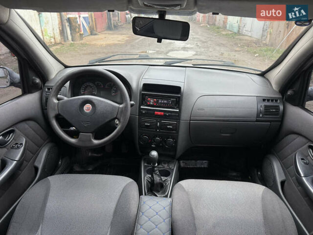 Серый Фиат Альбеа, объемом двигателя 1.4 л и пробегом 160 тыс. км за 2850 $, фото 5 на Automoto.ua