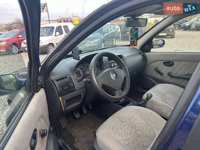 Синий Фиат Альбеа, объемом двигателя 1.37 л и пробегом 255 тыс. км за 3300 $, фото 5 на Automoto.ua