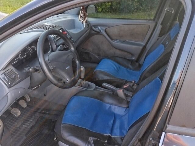 Черный Фиат Брава, объемом двигателя 1.6 л и пробегом 250 тыс. км за 1450 $, фото 4 на Automoto.ua