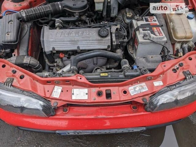 Червоний Фіат Брава, об'ємом двигуна 1.4 л та пробігом 250 тис. км за 2888 $, фото 1 на Automoto.ua