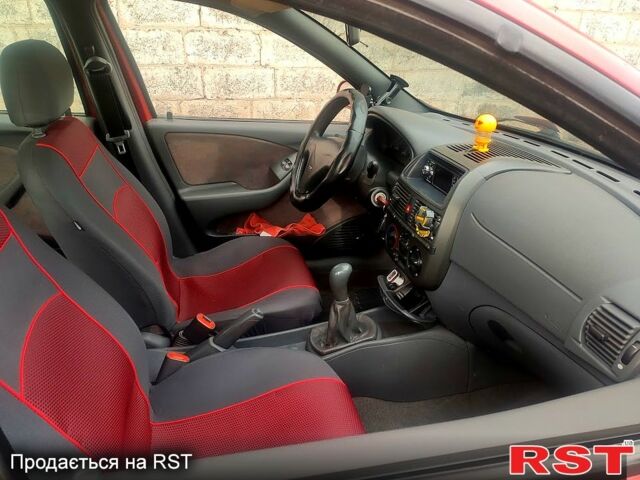 Красный Фиат Брава, объемом двигателя 1.6 л и пробегом 188 тыс. км за 1800 $, фото 1 на Automoto.ua