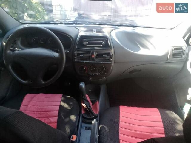 Красный Фиат Брава, объемом двигателя 1.4 л и пробегом 250 тыс. км за 2000 $, фото 4 на Automoto.ua