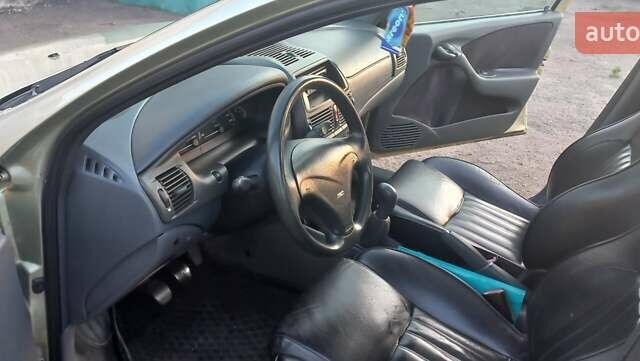 Серый Фиат Брава, объемом двигателя 1.75 л и пробегом 245 тыс. км за 1600 $, фото 4 на Automoto.ua