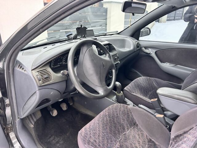 Серый Фиат Брава, объемом двигателя 1.4 л и пробегом 197 тыс. км за 1999 $, фото 18 на Automoto.ua