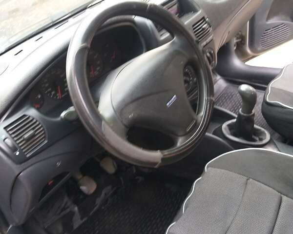 Серый Фиат Брава, объемом двигателя 1.58 л и пробегом 250 тыс. км за 1800 $, фото 5 на Automoto.ua