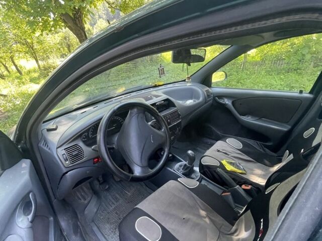 Зеленый Фиат Брава, объемом двигателя 1.7 л и пробегом 265 тыс. км за 1500 $, фото 4 на Automoto.ua