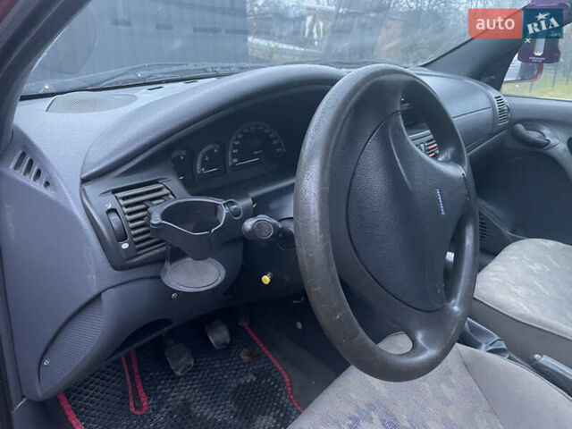 Красный Фиат Браво, объемом двигателя 1.37 л и пробегом 315 тыс. км за 890 $, фото 5 на Automoto.ua