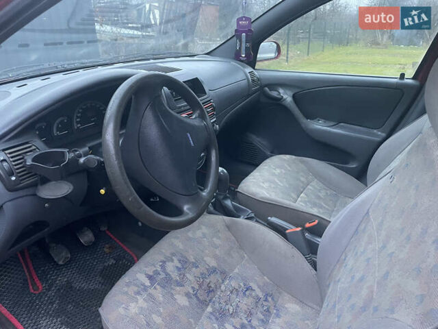 Красный Фиат Браво, объемом двигателя 1.37 л и пробегом 315 тыс. км за 890 $, фото 4 на Automoto.ua