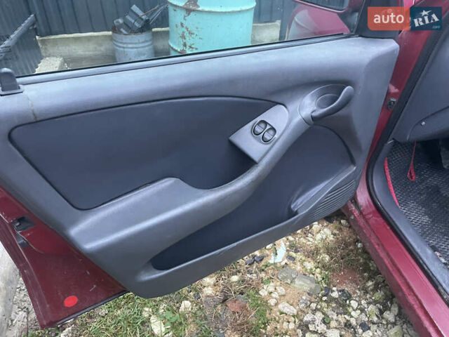 Красный Фиат Браво, объемом двигателя 1.37 л и пробегом 315 тыс. км за 890 $, фото 6 на Automoto.ua