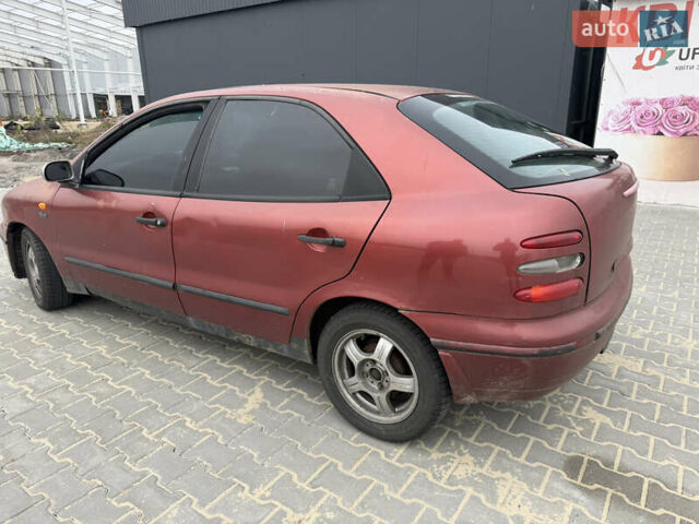 Красный Фиат Браво, объемом двигателя 1.6 л и пробегом 260 тыс. км за 1250 $, фото 8 на Automoto.ua