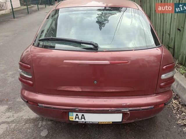 Красный Фиат Браво, объемом двигателя 1.6 л и пробегом 286 тыс. км за 750 $, фото 2 на Automoto.ua