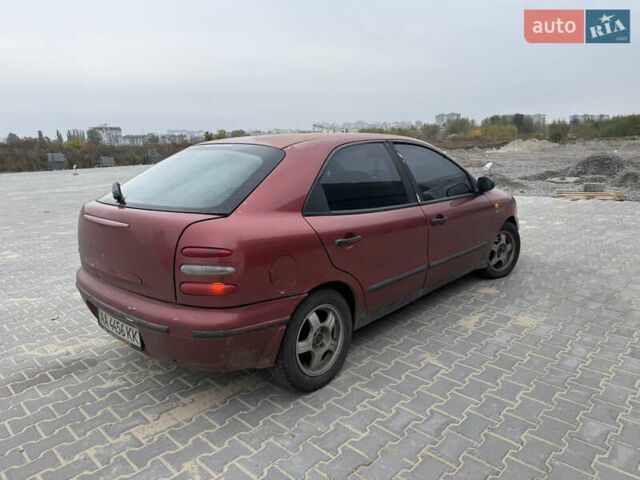 Красный Фиат Браво, объемом двигателя 1.6 л и пробегом 260 тыс. км за 1250 $, фото 6 на Automoto.ua