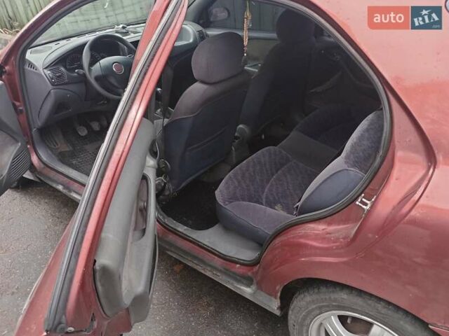 Красный Фиат Браво, объемом двигателя 1.6 л и пробегом 286 тыс. км за 750 $, фото 5 на Automoto.ua