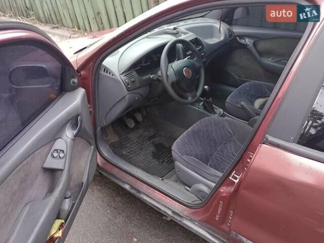 Красный Фиат Браво, объемом двигателя 1.6 л и пробегом 286 тыс. км за 750 $, фото 4 на Automoto.ua