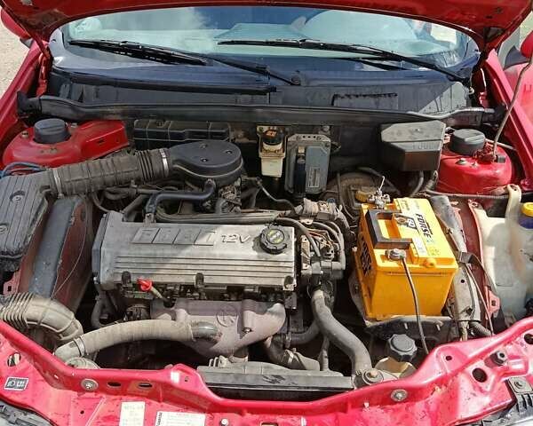 Красный Фиат Браво, объемом двигателя 1.4 л и пробегом 230 тыс. км за 1500 $, фото 1 на Automoto.ua