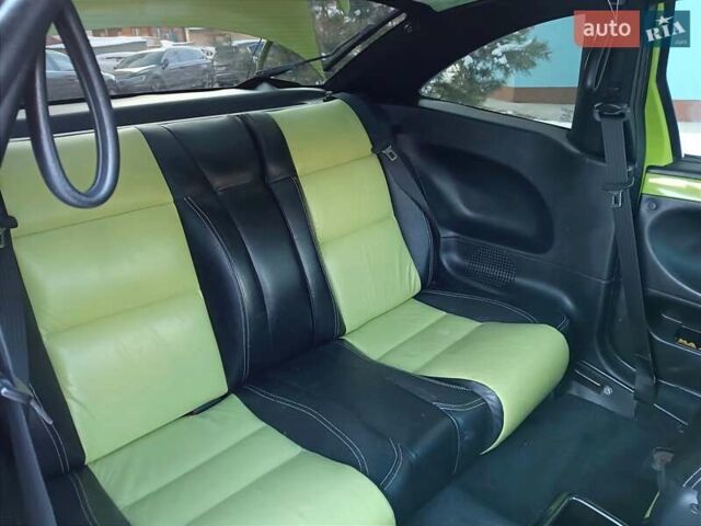 Зеленый Фиат Купе, объемом двигателя 2 л и пробегом 97 тыс. км за 5000 $, фото 17 на Automoto.ua