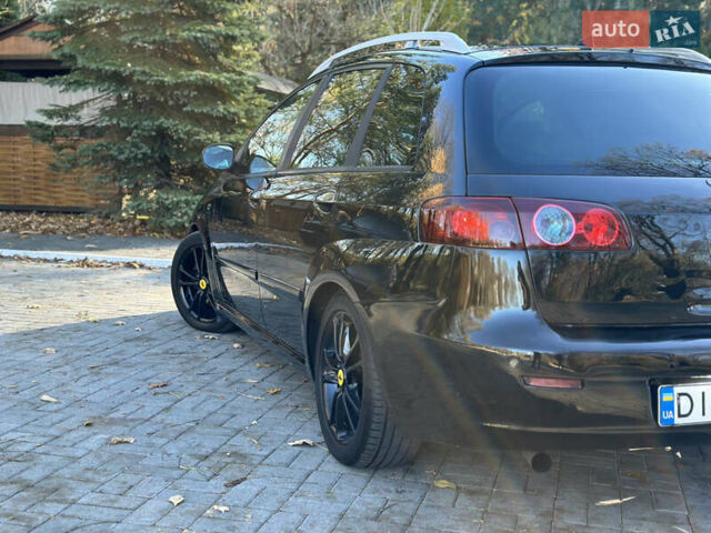 Черный Фиат Крома, объемом двигателя 2.4 л и пробегом 270 тыс. км за 4200 $, фото 25 на Automoto.ua