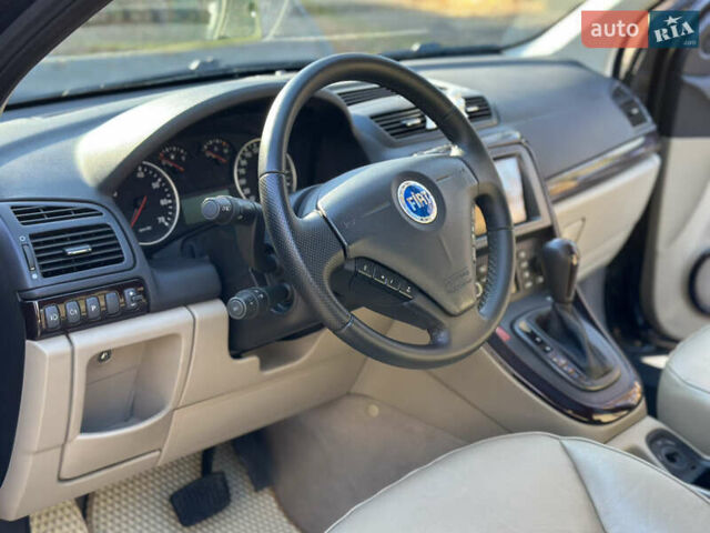 Черный Фиат Крома, объемом двигателя 2.4 л и пробегом 270 тыс. км за 4200 $, фото 40 на Automoto.ua