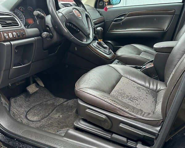 Черный Фиат Крома, объемом двигателя 1.91 л и пробегом 280 тыс. км за 5500 $, фото 7 на Automoto.ua
