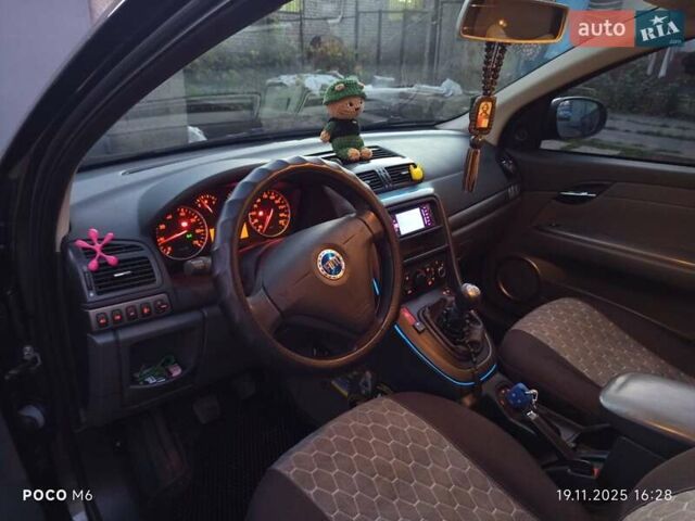 Серый Фиат Крома, объемом двигателя 1.8 л и пробегом 236 тыс. км за 4000 $, фото 5 на Automoto.ua