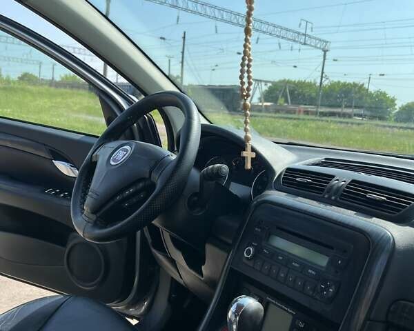 Серый Фиат Крома, объемом двигателя 1.91 л и пробегом 259 тыс. км за 6000 $, фото 21 на Automoto.ua