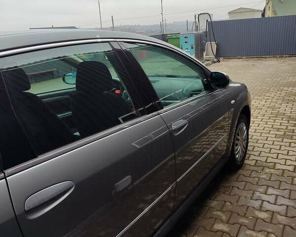 Серый Фиат Крома, объемом двигателя 1.8 л и пробегом 221 тыс. км за 5800 $, фото 12 на Automoto.ua