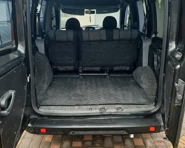 Черный Фиат Добло Панорама, объемом двигателя 1.37 л и пробегом 277 тыс. км за 5000 $, фото 4 на Automoto.ua