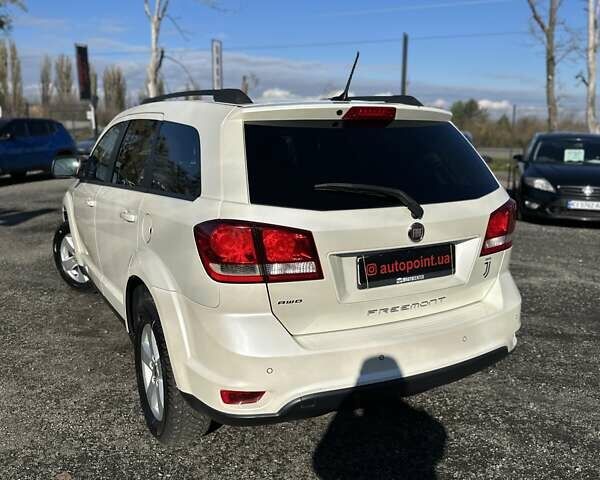 Фиат Фримонт 2014 в Буче на Automoto.ua Белый Фиат Фримонт, объемом двигателя 1.96 л и пробегом 269 тыс. км за 14200 $, фото 10 на Automoto.ua