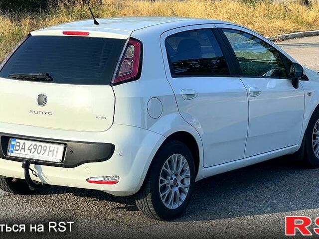 Белый Фиат Гранде Пунто, объемом двигателя 1.4 л и пробегом 187 тыс. км за 5400 $, фото 1 на Automoto.ua