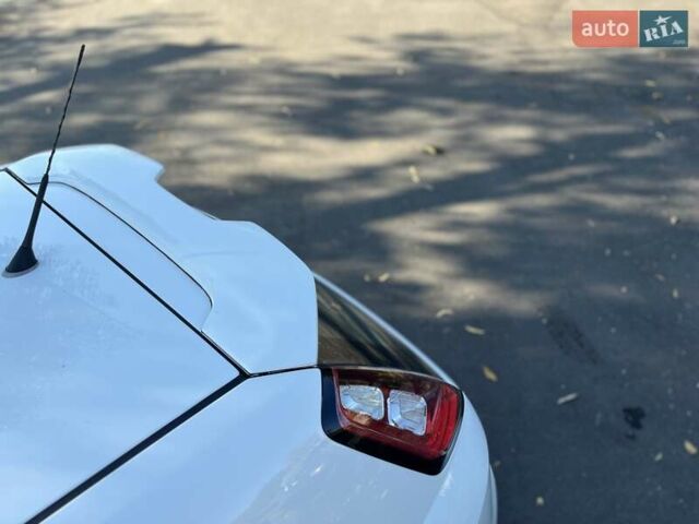 Белый Фиат Гранде Пунто, объемом двигателя 1.25 л и пробегом 145 тыс. км за 7000 $, фото 14 на Automoto.ua