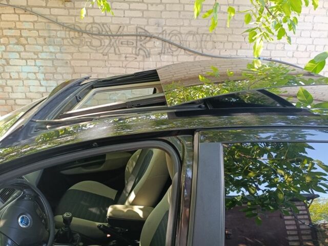 Черный Фиат Гранде Пунто, объемом двигателя 1.2 л и пробегом 287 тыс. км за 4500 $, фото 21 на Automoto.ua