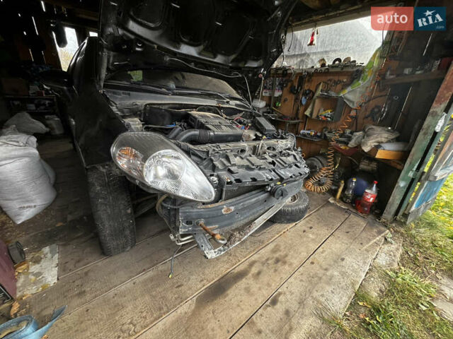 Черный Фиат Гранде Пунто, объемом двигателя 1.37 л и пробегом 250 тыс. км за 1500 $, фото 5 на Automoto.ua