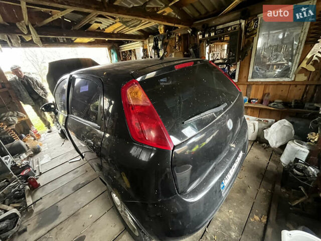Черный Фиат Гранде Пунто, объемом двигателя 1.37 л и пробегом 250 тыс. км за 1500 $, фото 6 на Automoto.ua