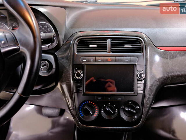 Черный Фиат Гранде Пунто, объемом двигателя 1.4 л и пробегом 189 тыс. км за 4900 $, фото 18 на Automoto.ua