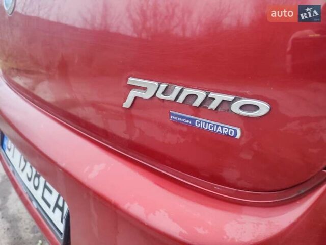 Червоний Фіат Гранде Пунто, об'ємом двигуна 1.24 л та пробігом 126 тис. км за 2200 $, фото 21 на Automoto.ua