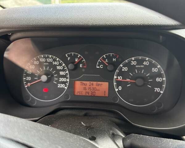 Красный Фиат Гранде Пунто, объемом двигателя 1.37 л и пробегом 161 тыс. км за 2900 $, фото 9 на Automoto.ua