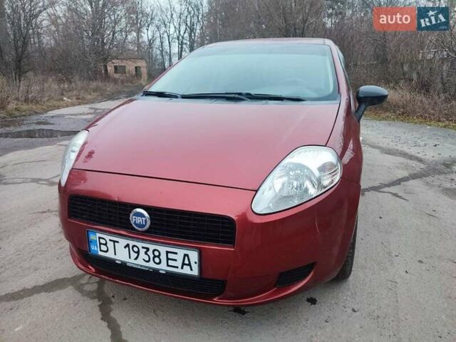 Червоний Фіат Гранде Пунто, об'ємом двигуна 1.24 л та пробігом 126 тис. км за 2200 $, фото 7 на Automoto.ua